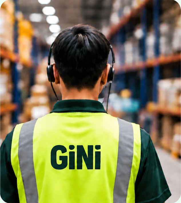 Associate in high-vis GiNi vest using headset
